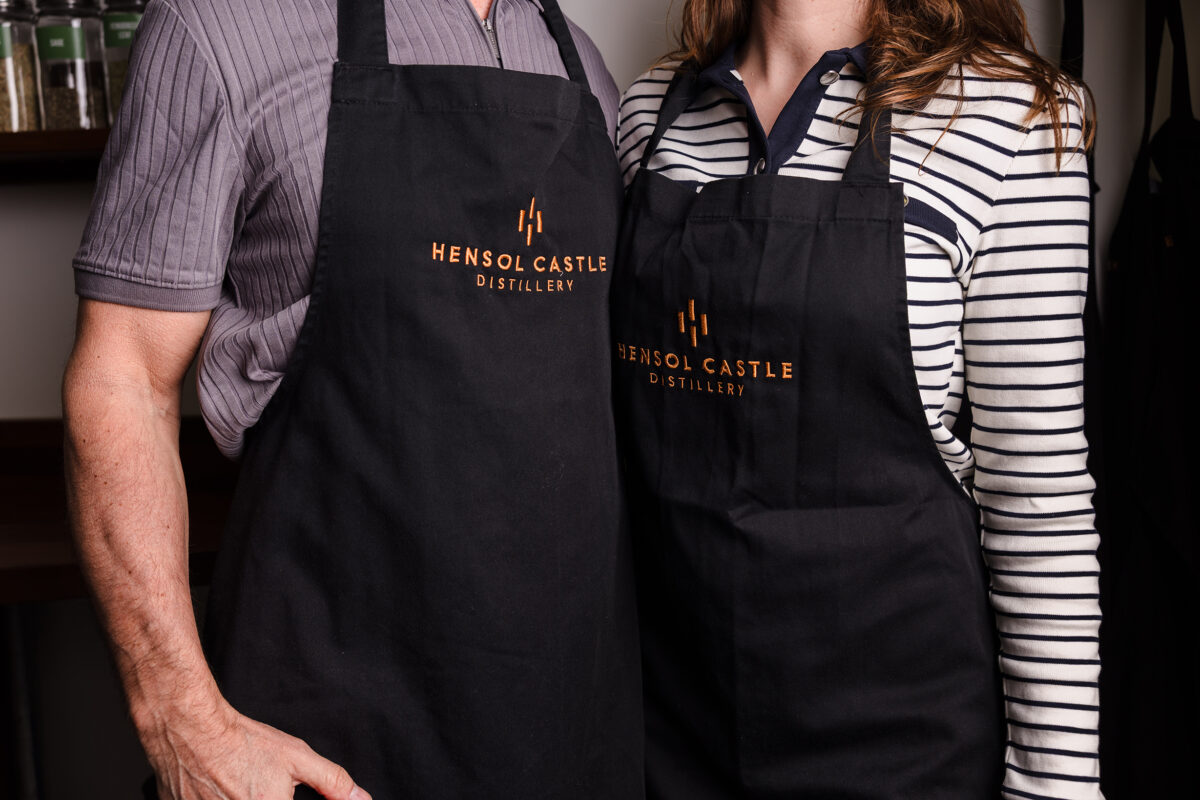 couple in matching aprons