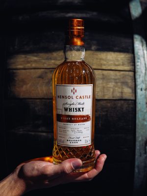 Hand holding Single Malt Whiskey